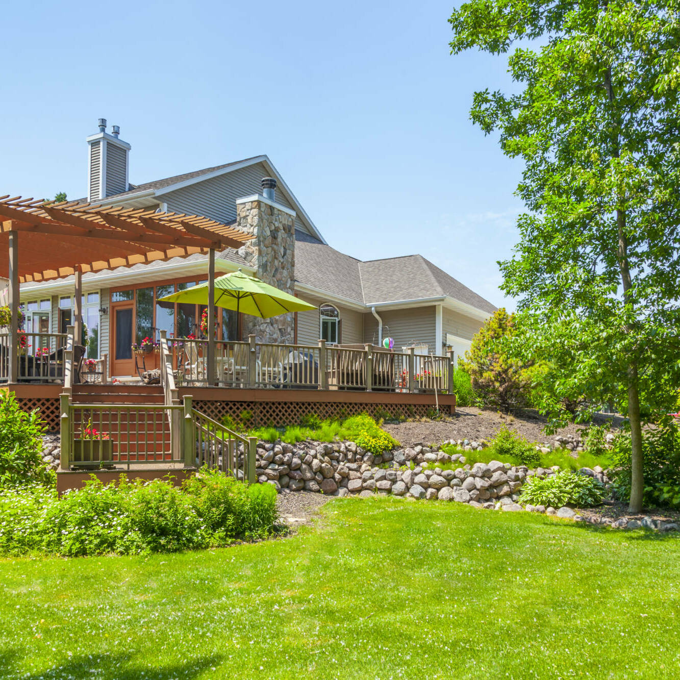 Beautiful Landscaped Yard and Deck with Pergola